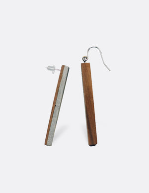 Yomo Studio rectangle brass earrings. Materials include: concrete and brass.