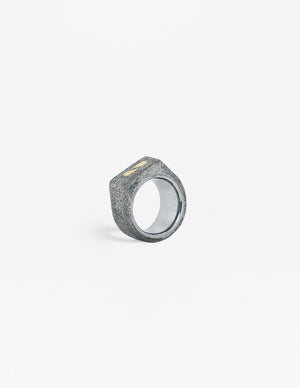 Yomo Studio 6mm split brass ring. Materials include: concrete, brass, and tungsten ring.
