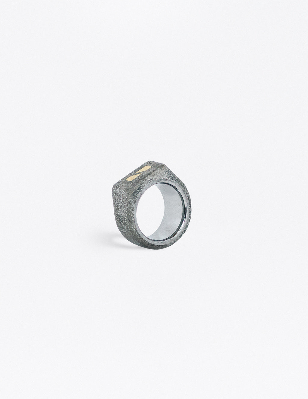 Yomo Studio 6mm split brass ring. Materials include: concrete, brass, and tungsten ring.