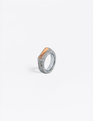 Yomo Studio grey 6mm triangles ring. Materials include: concrete, tungsten ring, walnut and pine wood.