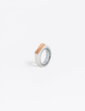 Yomo Studio grey 6mm triangles ring. Materials include: concrete, tungsten ring, walnut and pine wood.